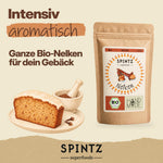 Ganze SPINTZ Bio-Nelken zum Würzen von Gebäck, dargestellt mit Kuchen und Mörser.