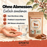 SPINTZ Bio-Nelken-Kapseln zur Einnahme ohne Abmessen, dargestellt mit Kapseln in der Hand und einem Glas Wasser.